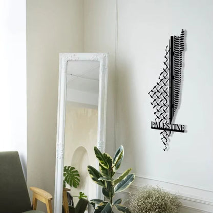 Decorative wall art with 'Palestine' on a white wall next to a mirror.