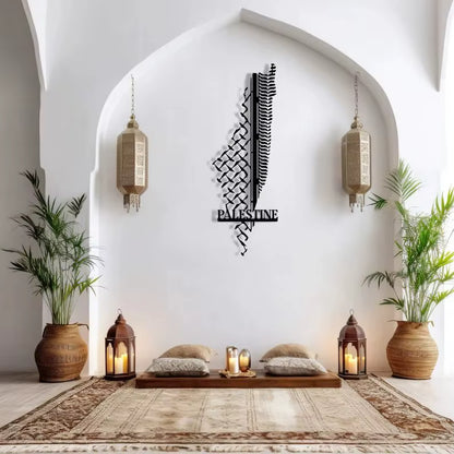 Decorative metal wall art with 'Palestine' on a white wall with lanterns and plants.