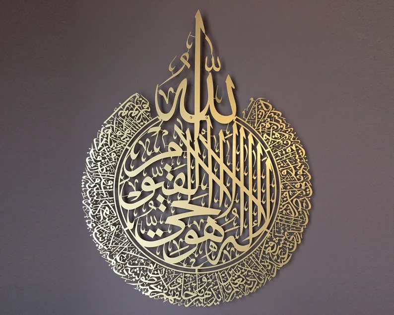 Decorative gold Arabic calligraphy on a dark background