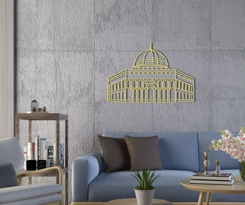 golden metal wall art of Al-Aqsa (dome of the rock) on a light background in a modern living room