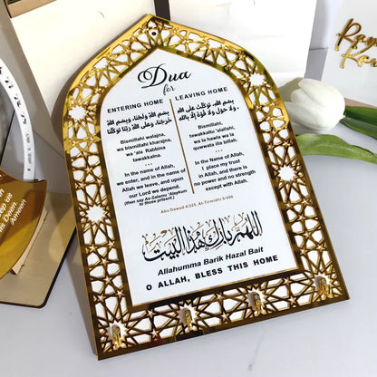 Decorative wall hook with Islamic prayer text and key holders on a white surfice