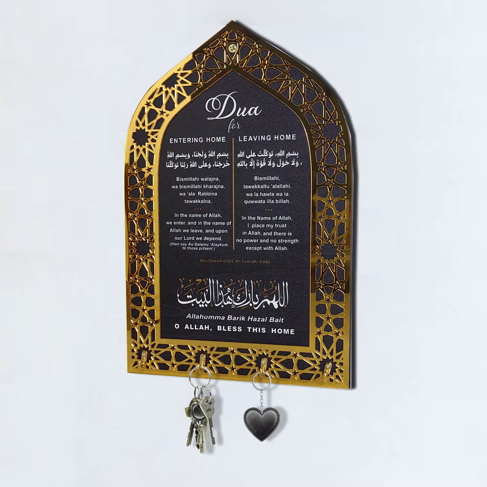 Decorative wall plaque with Arabic text and key holders on a white background