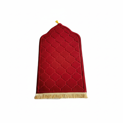 Red prayer mat with a yellow string on a white background