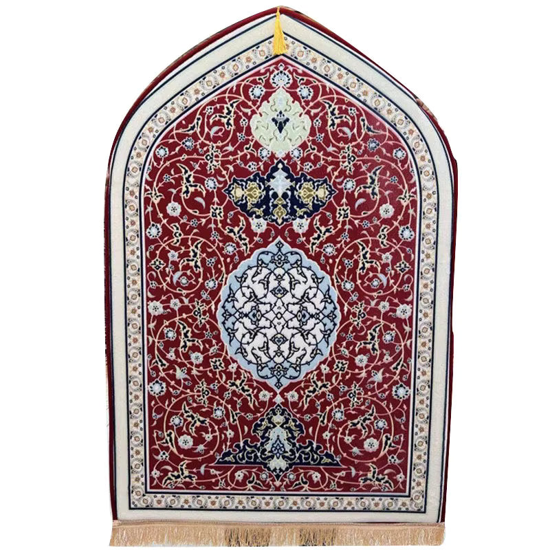 Decorative prayer rug with intricate patterns on a white background